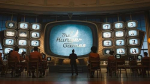 Image of a large TV screen with The Hunger Games logo