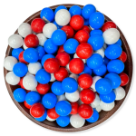 bowl of small candies, colored red, white, and blue 