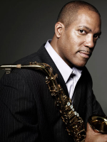 Man holding a saxophone 