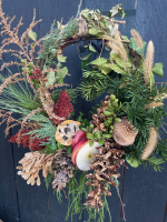 Wreath with fruit and pinecones