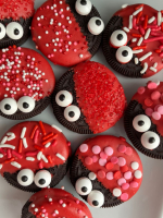 Oreo Cookies decorated to look like a red bug