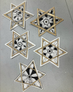 Patterns decorate paper stars.