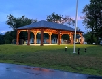 image of lighted pavilion in evening