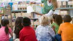 Librarian reading to children at storytime.