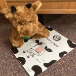 picture of stuffed cow and journal