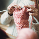 Woman's hands are knitting