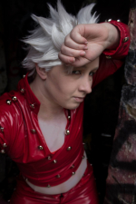 Professional cosplayer Tracy Parenteau poses for a photo in cosplay. They have pale skin, and have a