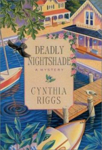 Cover illustrations showing boats, cottages, and water.  
