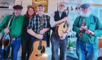 group of five musicians with their instruments