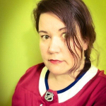 Headshot of author Rachel Reid