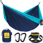 A navy blue and teal camping hammock, along with an image of the hammock packed into a bag, two blac