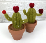 felted cactus with hearts in a small plant pot