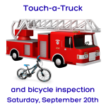 A picture of a fire truck and a blue child's bike