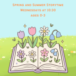 an open book on a field of flowers