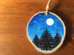 Wood circle with painted winter scene