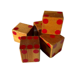 Five wooden blocks with red dots arranged close together on a white background.