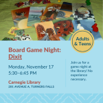 Game pieces from the board game Dixit sit on a green dropcloth