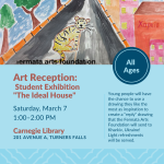 Tiger sitting in the road next to buidings.