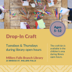 Craft supplies on a wooden table.