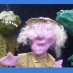 Woman with 2 dinosaurs