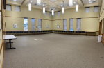 open meeting room space with chairs surrounding the perimeter