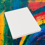 A book with a blank white cover on a colorful paint-splattered background.