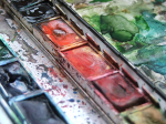Watercolor palettes being used.
