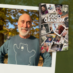 Ted Page with Good Grandpa book next to him, Ted Page is wearing a shirt with a cartoon bear on it.
