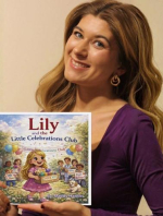 Miss Greater Derry holding a book she wrote.