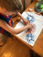 A child making a t-shirt for the fourth of July.