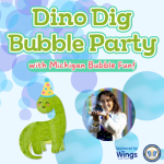 Pale blue background with bubbles floating around. A green dinosaur in a party hat stands beneath th