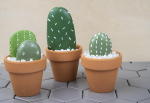 Craft of cactus garden made from painted rocks.