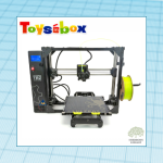 blue background, white square, forefront lulzbot 3d printer, toysinbox logo
