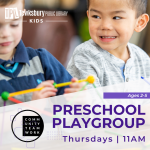 Two preschoolers play with STEM toys. 