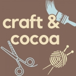 A white background with a simple image of yellow yarn and a teal cocoa mug with the text &ldquo;craf