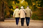 three older people walking away