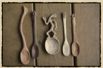 various carved spoons displayed