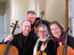 Picture of four musicians 