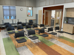 classroom with no tables and 4 rows of 5 chairs each.