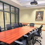 The Adelaide Phillips Conference Room features moveable tables, conference chairs, and a built-in pr