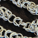 A close-up of a chainmaille bracelet.