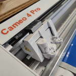 A close-up of the Silhouette vinyl cutter.