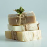 Three bars of soap in shades of brown.