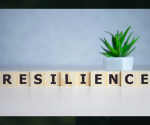 scrabble tiles that spell out resilience. 