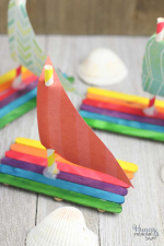 Boat craft made out of colorful popsicle sticks.