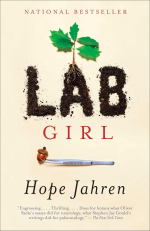 Book cover where the word "lab" is written in dirt with a sapling tree growing out of it and a pair 