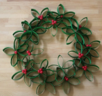 Green multi-layered wreath with red beads.