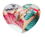 A heart shaped photo collage on a white background with knitting and crocheting.