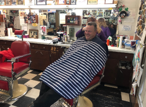 Jon Tester getting a haircut