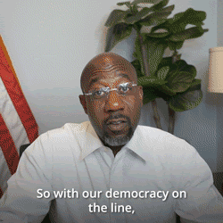 Gif of senator Warnock: 'So with our Democracy on the line'